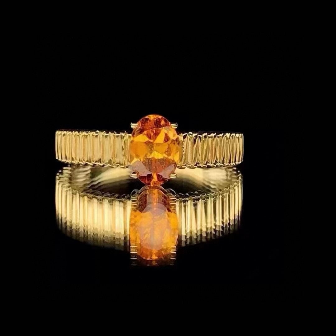 14k Gold 1.1 Ct Natural Spessartine Ring: Ref:231052190 // gold content:14k gold // ring size:7. 25us // // main gemstone:spessartine // shape:oval // carat weight:1. 1ct // color:orange // treatment:natural // Condition: New Low Estimate: 21