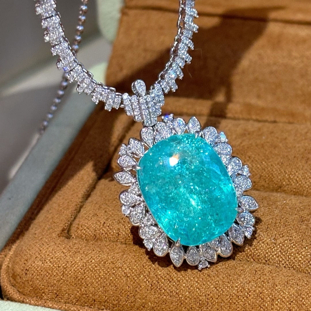 14k Gold 15 Ct Natural Paraiba Tourmaline & Diamond Necklace: Ref:231052198 // gold content:14k gold // main gemstone:paraiba tourmaline // shape:cushion // carat weight:15ct // color:blue // treatment:natural // // adjacent gemstone 2 : diamond // shape:round