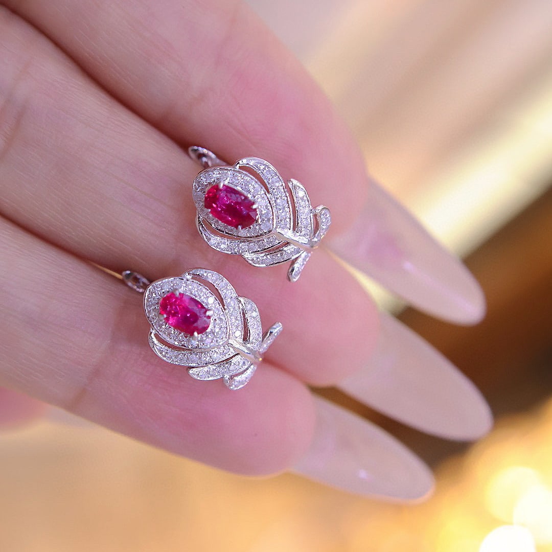 14k Gold 0.6 Ct Natural Ruby & Diamond Earrings: Ref:231052206 // gold content:14k gold // main gemstone:ruby // shape:oval // carat weight:0. 6ct // color:red // treatment:natural // // adjacent gemstone 2 : diamond // shape:round // clarity