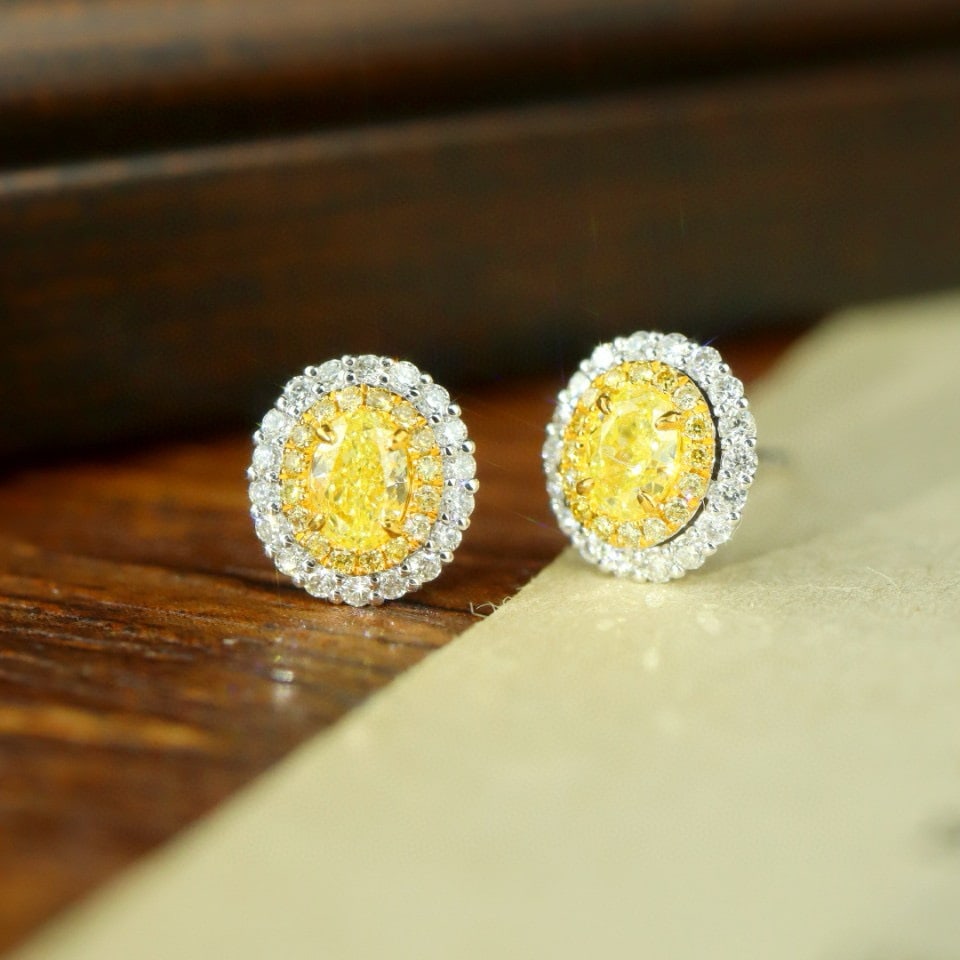 14k Gold 0.71 Ctw Natural Yellow Diamond & Diamond Earrings: Ref:231052240 // gold content:14k gold // main gemstone:yellow diamond // shape:oval // carat weight:0. 45ct // color:yellow // treatment:natural // // adjacent gemstone 2 : diamond // shape:round // 