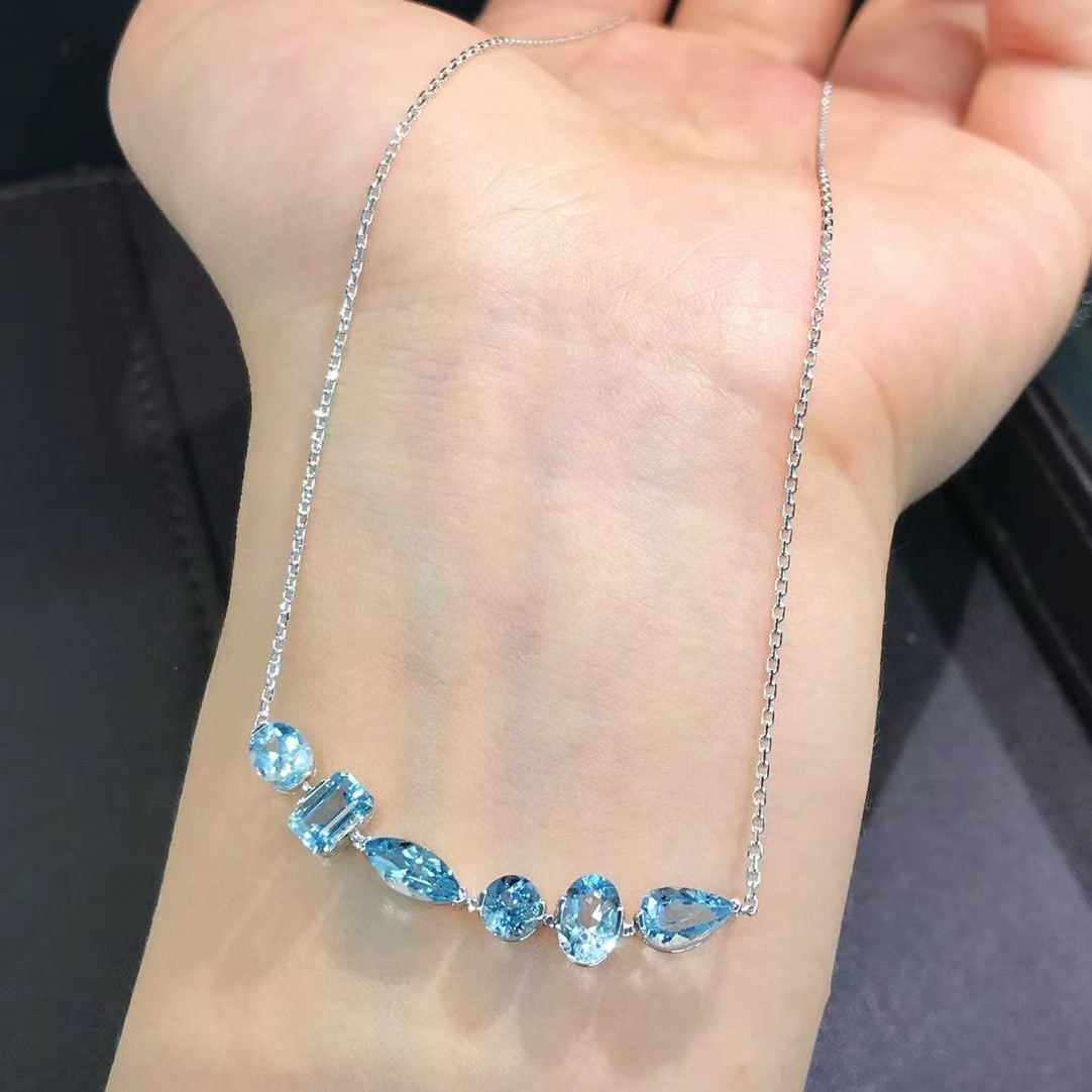 14k Gold 2.96 Ct Natural Aquamarine Necklace: Ref:231052278 // gold content:14k gold // main gemstone:aquamarine // shape:multiply // carat weight:2. 96ct // color:santa maria color // treatment:natural // Condition: New Low Estimate: 7000.00 Hig