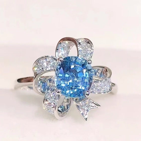 14k Gold 1.49 Ctw Natural Aquamarine & Diamond Ring: Ref:231052304 // gold content:14k gold // ring size:7. 25us // // main gemstone:aquamarine // shape:oval // carat weight:1. 32ct // color:santa maria color // treatment:natural // // adjacent
