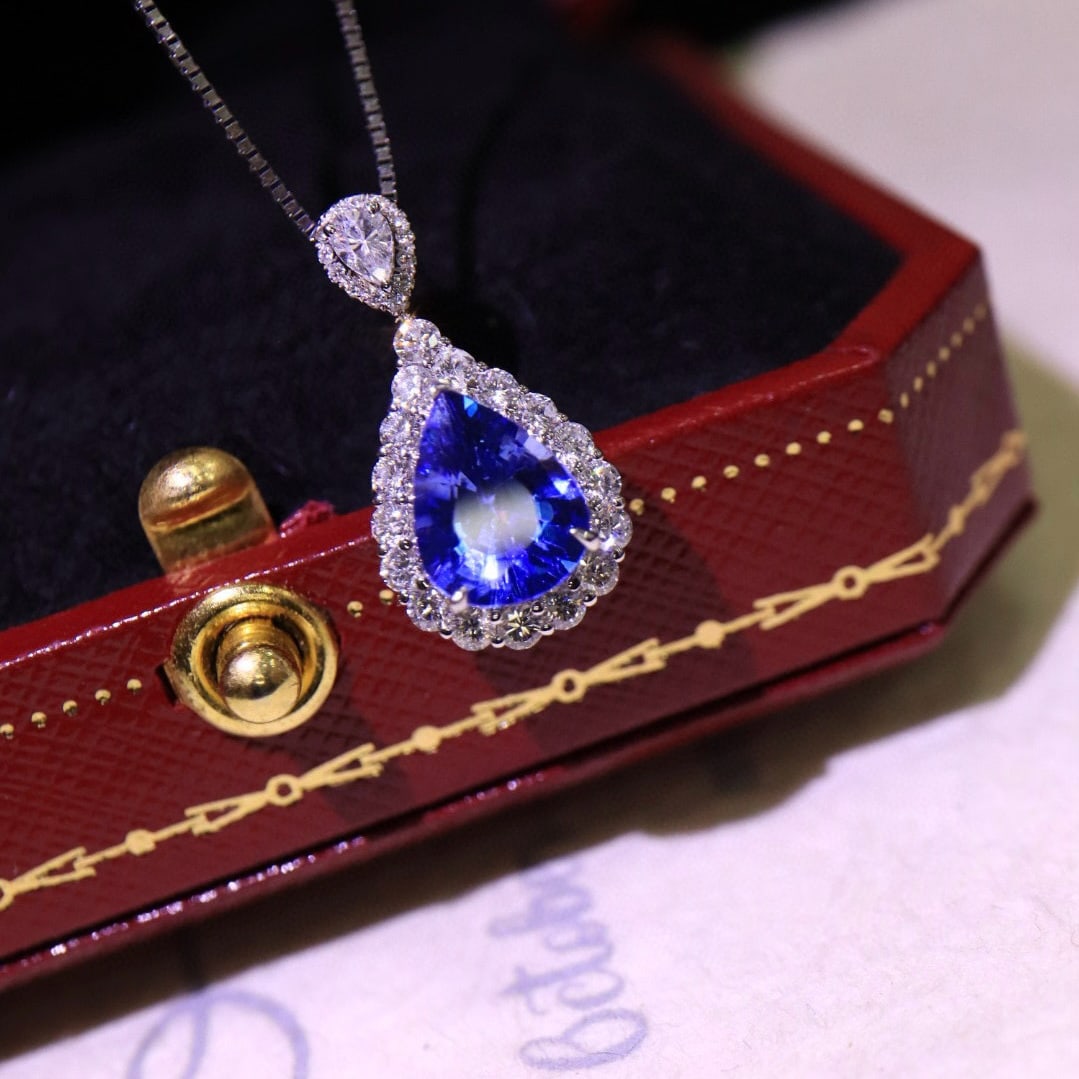 14k Gold 2.51 Ctw Natural Sapphire & Diamond Pendant( Without Chain ): Ref:231052317 // gold content:14k gold // main gemstone:sapphire // shape:pear // carat weight:1. 97ct // color:cornflower blue // treatment:natural // // adjacent gemstone 2 : diamond // shape:round 