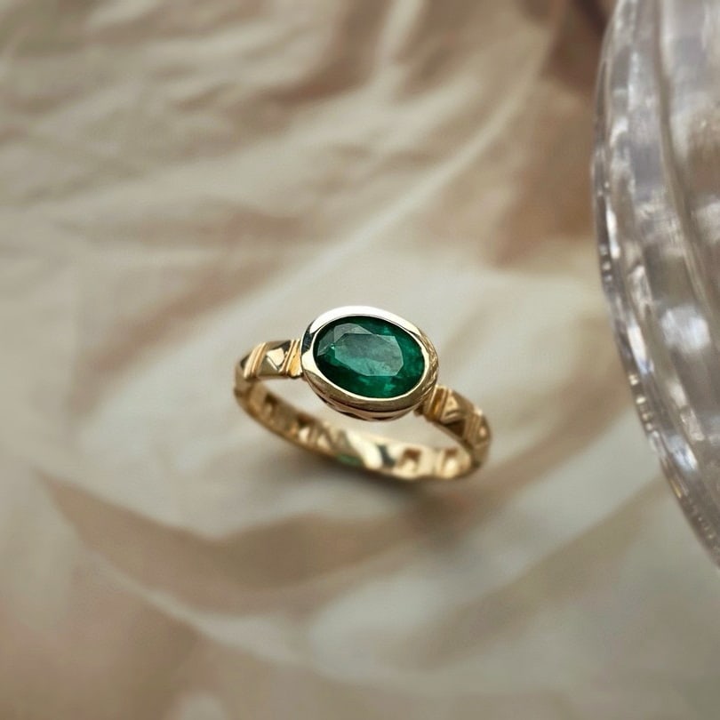 14k Gold 0.9 Ct Natural Emerald Ring: Ref:231052323 // gold content:14k gold // ring size:7. 25us // // main gemstone:emerald // shape:oval // carat weight:0. 9ct // color:green // treatment:natural // Condition: New Low Estimate: