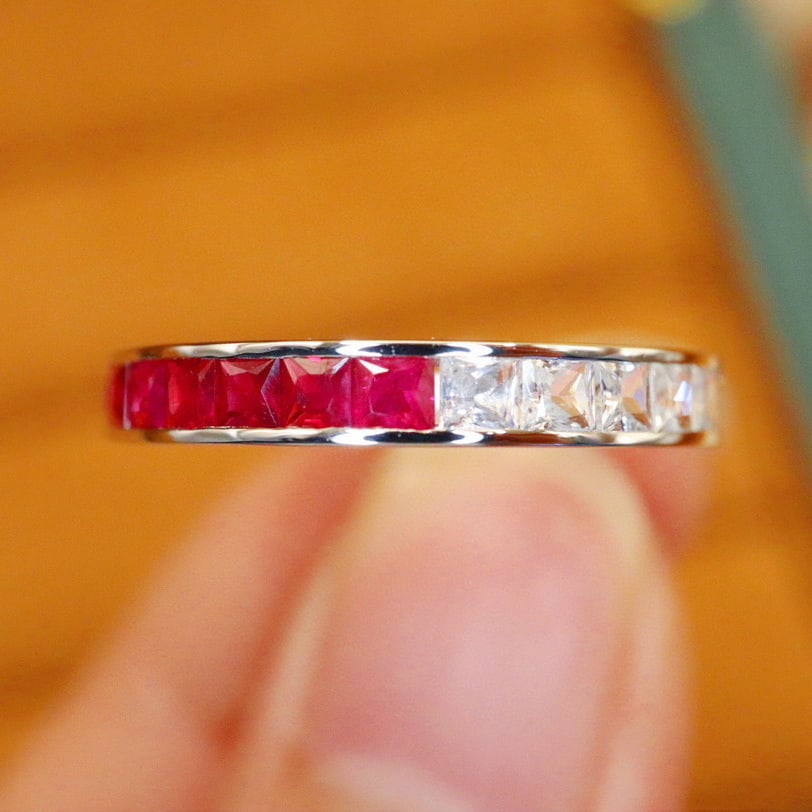 14k Gold 0.89 Ctw Natural Ruby & Sapphire Ring: Ref:231052332 // gold content:14k gold // ring size:7. 25us // // main gemstone:ruby // shape:princess // carat weight:0. 49ct // color:red // treatment:natural // // adjacent gemstone 2 : sapphire