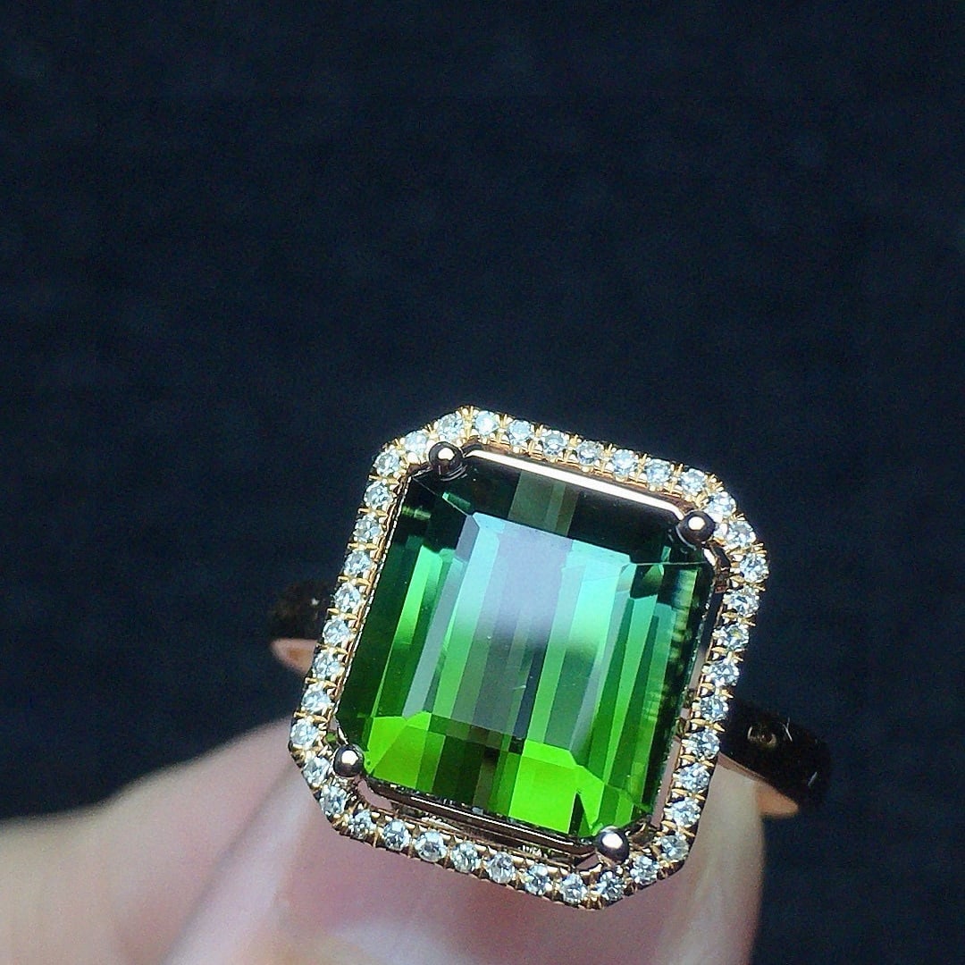 14k Gold 4.13 Ct Natural Tourmaline & Diamond Ring: Ref:231052342 // gold content:14k gold // ring size:7. 25us // // main gemstone:tourmaline // shape:octagonal // carat weight:4. 13ct // color:green // treatment:natural // // adjacent gemstone 2 :