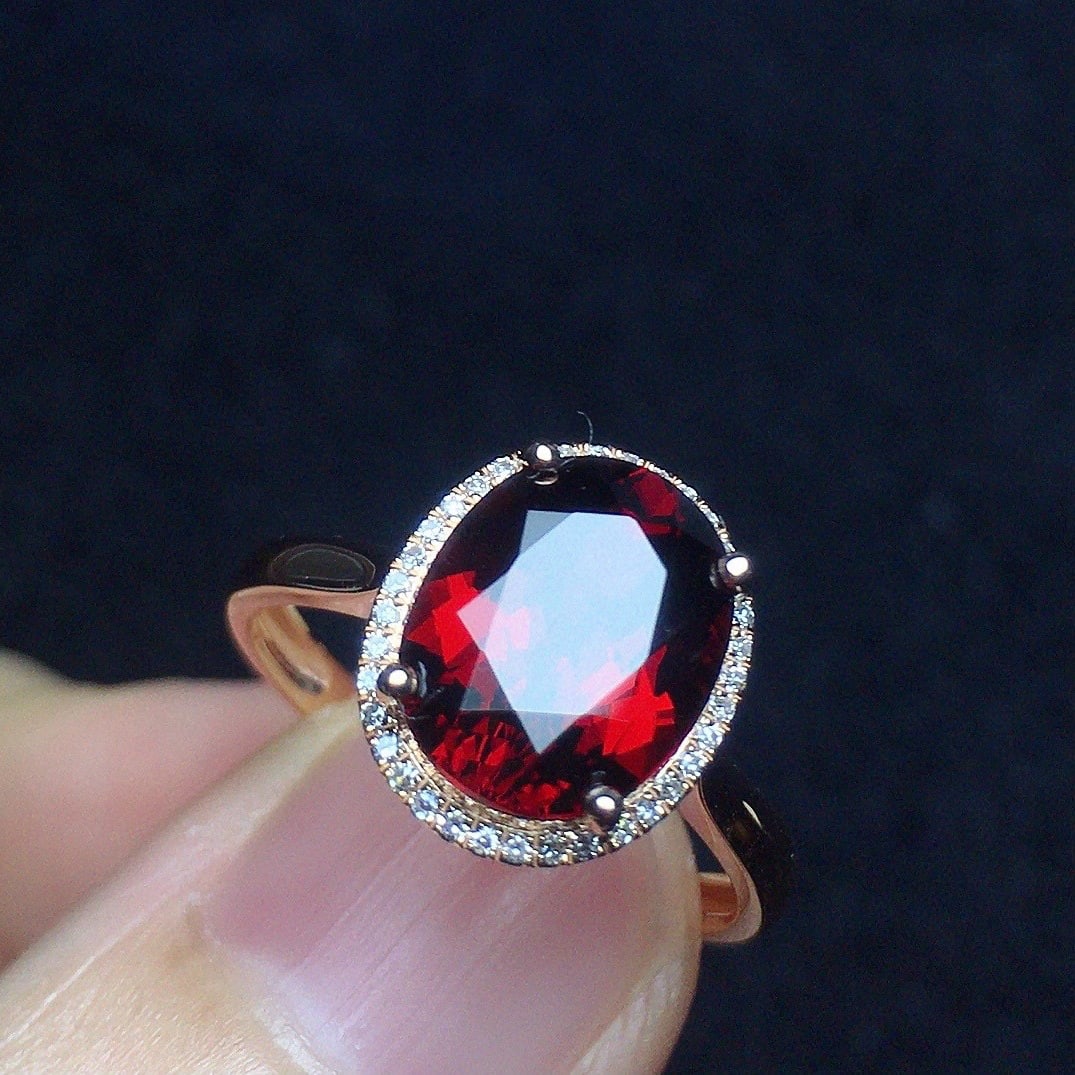 14k Gold 3.29 Ct Natural Garnet & Diamond Ring: Ref:231052345 // gold content:14k gold // ring size:7. 25us // // main gemstone:garnet // shape:oval // carat weight:3. 29ct // color:red // treatment:natural // // adjacent gemstone 2 : diamond //
