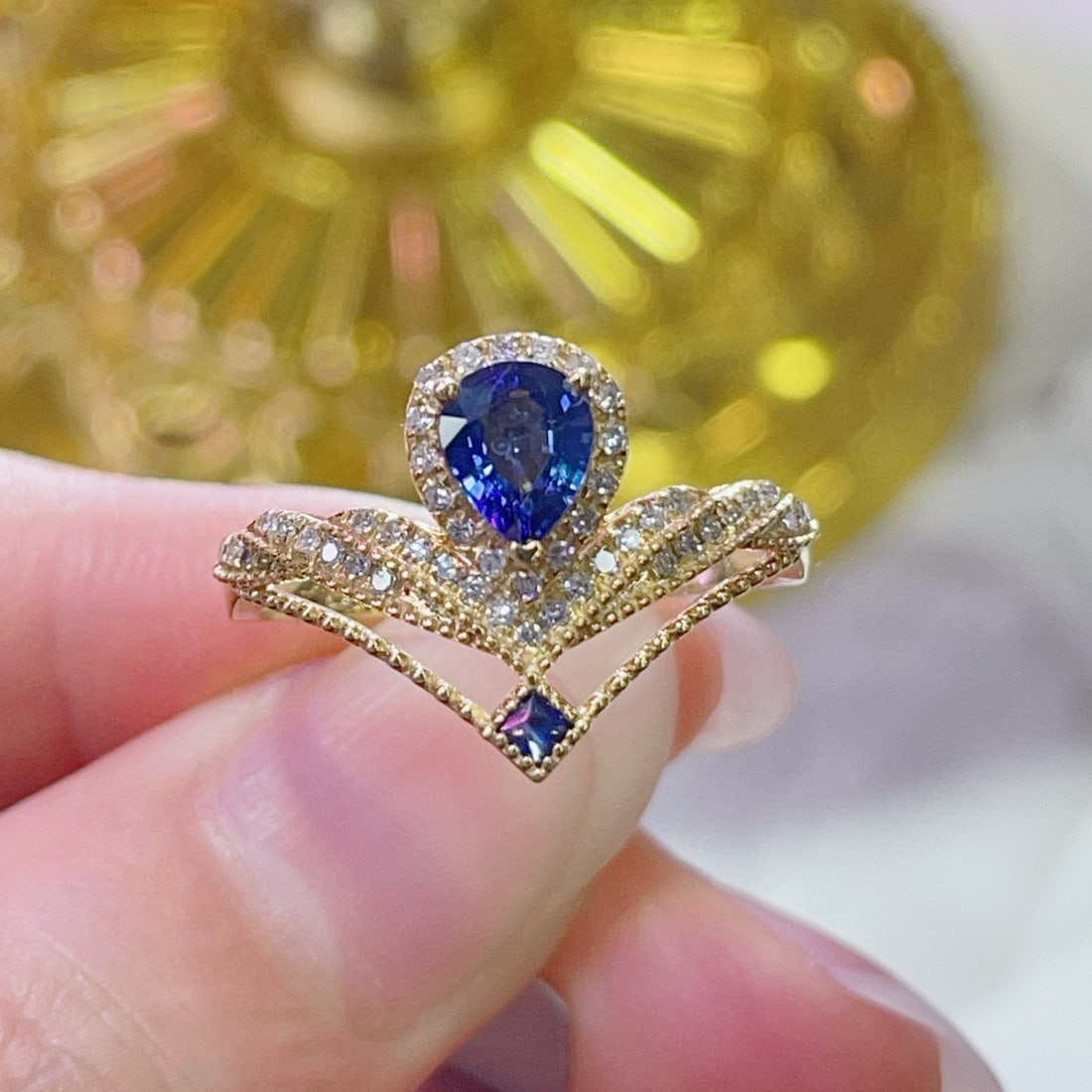 14k Gold 0.83 Ctw Natural Sapphire & Diamond Ring: Ref:231052354 // gold content:14k gold // ring size:7. 25us // // main gemstone:sapphire // shape:pear // carat weight:0. 62ct // color:blue // treatment:natural // // adjacent gemstone 2 : diamond