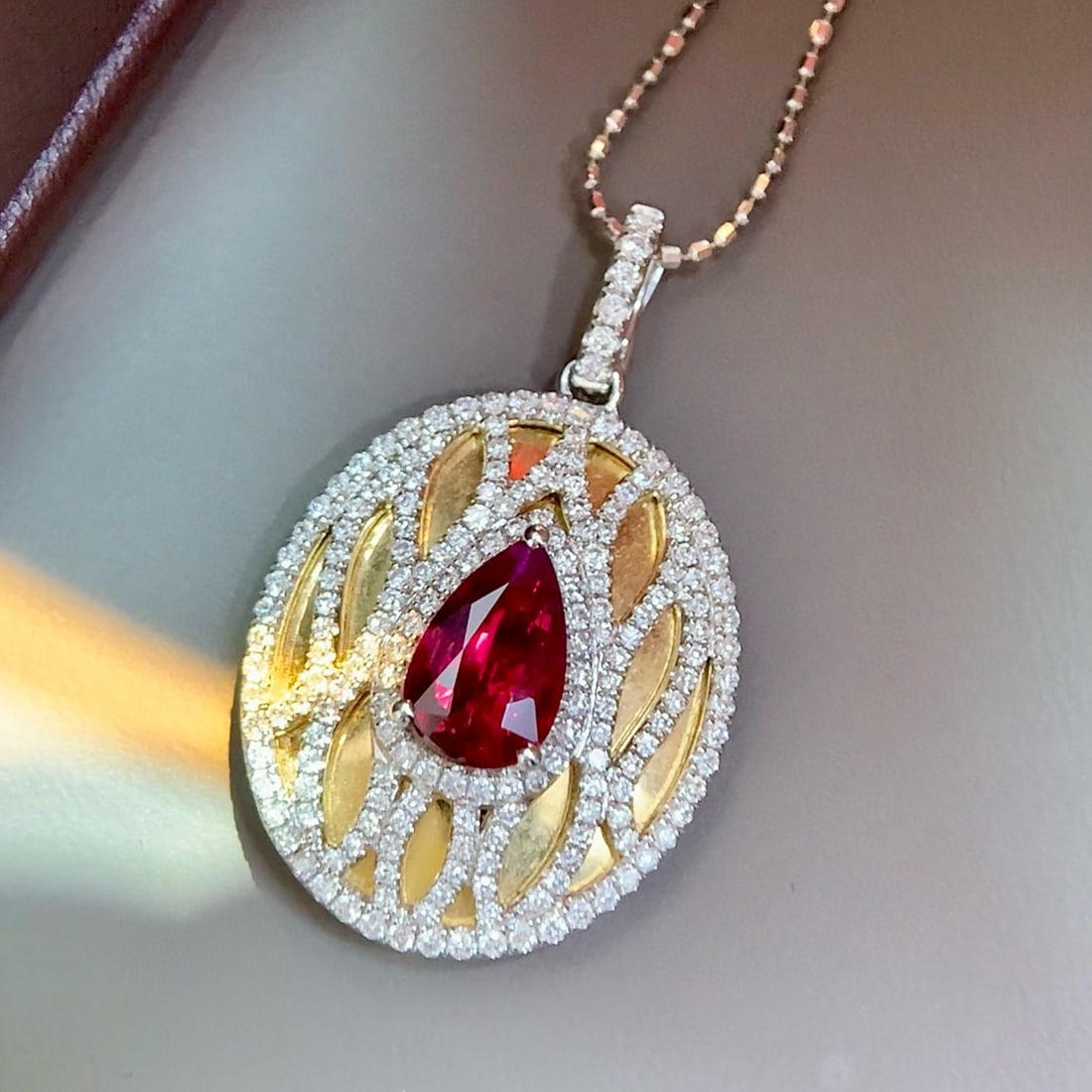 14k Gold 1.62 Ctw Natural Ruby & Diamond Pendant( Without Chain ): Ref:231052360 // gold content:14k gold // main gemstone:ruby // shape:pear // carat weight:1. 08ct // color:pigeonblood red // treatment:natural // // adjacent gemstone 2 : diamond // shape:round // c