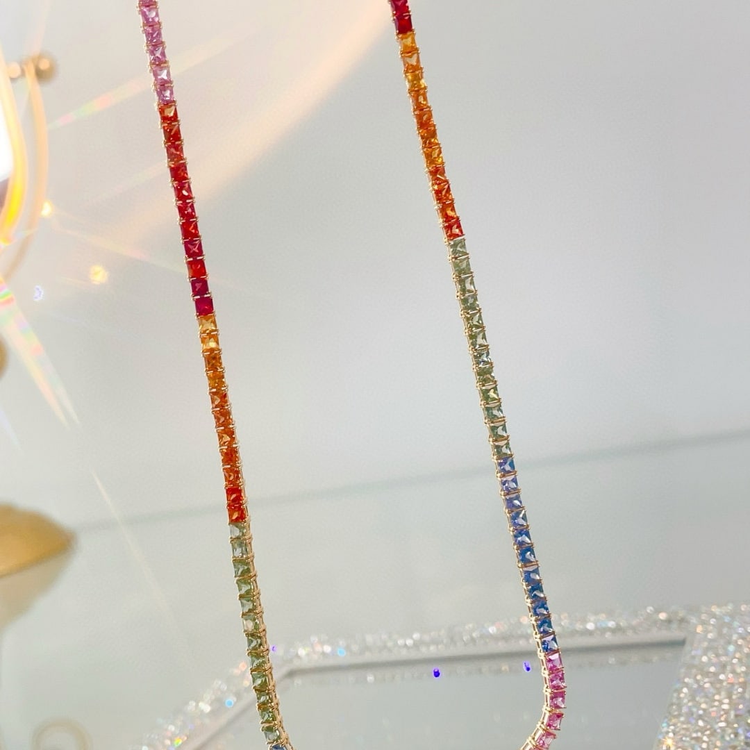 14k Gold 18.06 Ct Natural Sapphire Necklace: Ref:231052374 // gold content:14k gold // main gemstone:sapphire // shape:princess // carat weight:18. 06ct // color:color // treatment:natural // Condition: New Low Estimate: 13000.00 High Estimate: