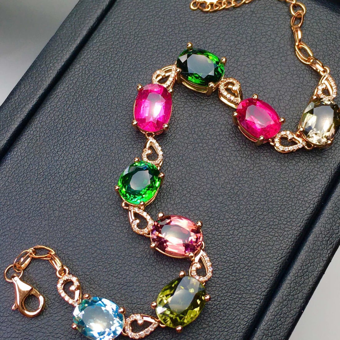 14k Gold 19.2 Ct Natural Tourmaline & Diamond Bracelet: Ref:231052447 // gold content:14k gold // main gemstone:tourmaline // shape:oval // carat weight:19. 2ct // color:color // treatment:natural // // adjacent gemstone 2 : diamond // shape:round // clari