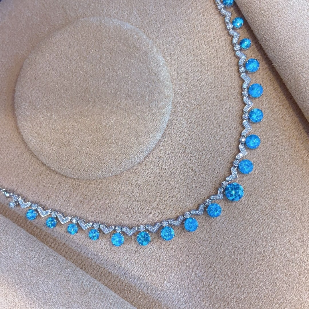 14k Gold 6.6 Ct Natural Paraiba Tourmaline & Diamond Necklace: Ref:231052449 // gold content:14k gold // main gemstone:paraiba tourmaline // shape:round // carat weight:6. 6ct // color:blue // treatment:natural // cut grade:g // // adjacent gemstone 2 : diamond