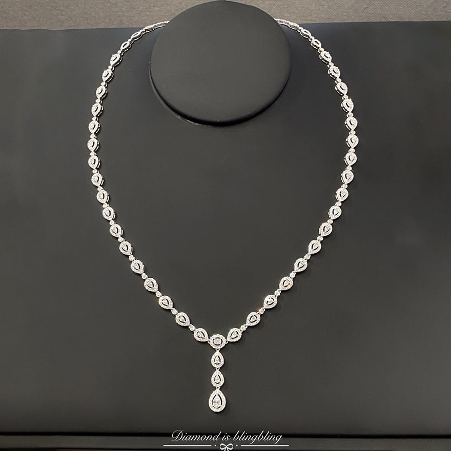 14k Gold 5 Ct Natural H Diamond Necklace: Ref:231053009 // gold content:14k gold // main gemstone:diamond // shape:multiply // carat weight:5ct // clarity grade:vs-si // color:h // treatment:natural // Condition: New Low Estimate: 20000.00