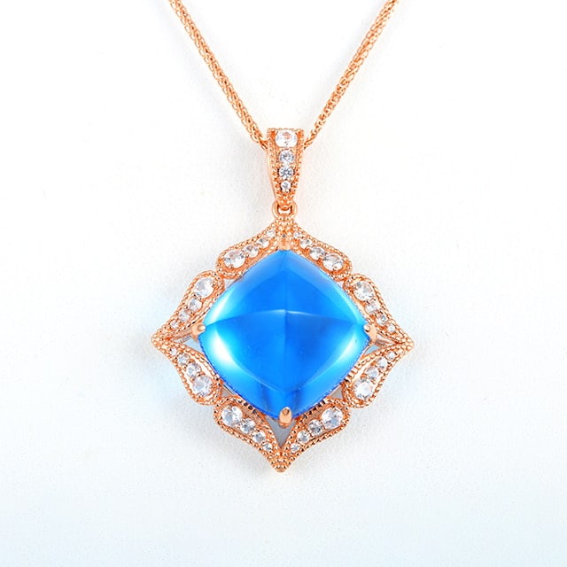 14k Gold 23.81 Ctw Natural Topaz & Sapphire Pendant( Without Chain ): Ref:231053044 // gold content:14k gold // main gemstone:topaz // shape:sugar-loaf // carat weight:23. 07ct // color:blue // treatment:natural // // adjacent gemstone 2 : sapphire // number of stones:3