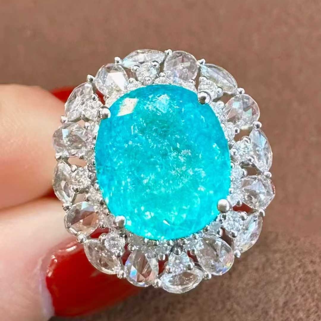 14k Gold 5.53 Ctw Natural Paraiba Tourmaline & Diamond Ring/pendant( Without Chain ): Ref:231053046 // gold content:14k gold // ring size:7. 25us // // main gemstone:paraiba tourmaline // shape:oval // carat weight:4. 51ct // color:neon blue // treatment:natural // // adjacent