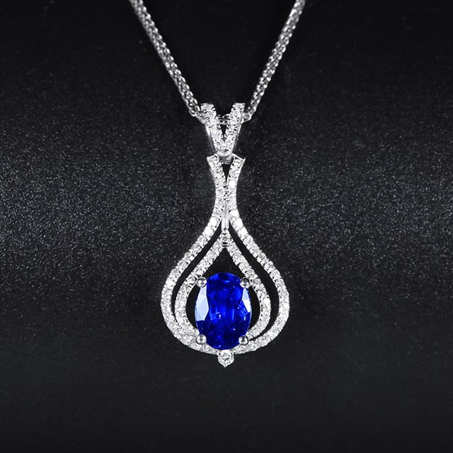14k Gold 1.18 Ctw Natural Sapphire & Diamond Pendant( Without Chain ): Ref:231053057 // gold content:14k gold // main gemstone:sapphire // shape:oval // carat weight:0. 95ct // color:blue // treatment:natural // // adjacent gemstone 2 : diamond // number of stones:76 //