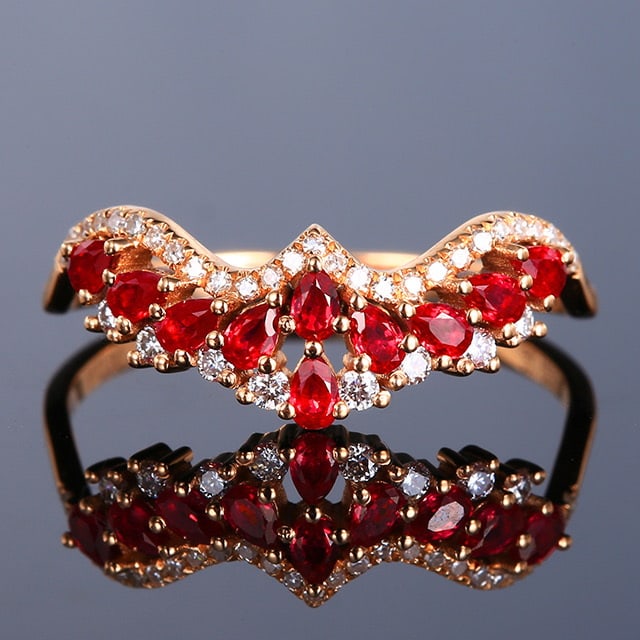 14k Gold 0.54 Ctw Natural Ruby & Diamond Ring: Ref:231053064 // gold content:14k gold // ring size:7. 25us // // main gemstone:ruby // shape:pear // carat weight:0. 38ct // color:red // treatment:natural // // adjacent gemstone 2 : diamond //