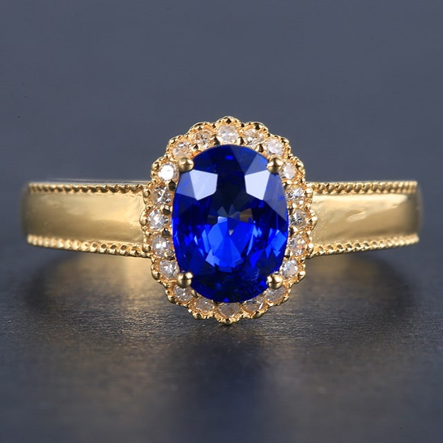 14k Gold 1.4 Ctw Natural Sapphire & Diamond Ring: Ref:231053067 // gold content:14k gold // ring size:7. 25us // // main gemstone:sapphire // shape:oval // carat weight:1. 3ct // color:blue // treatment:natural // // adjacent gemstone 2 : diamond //