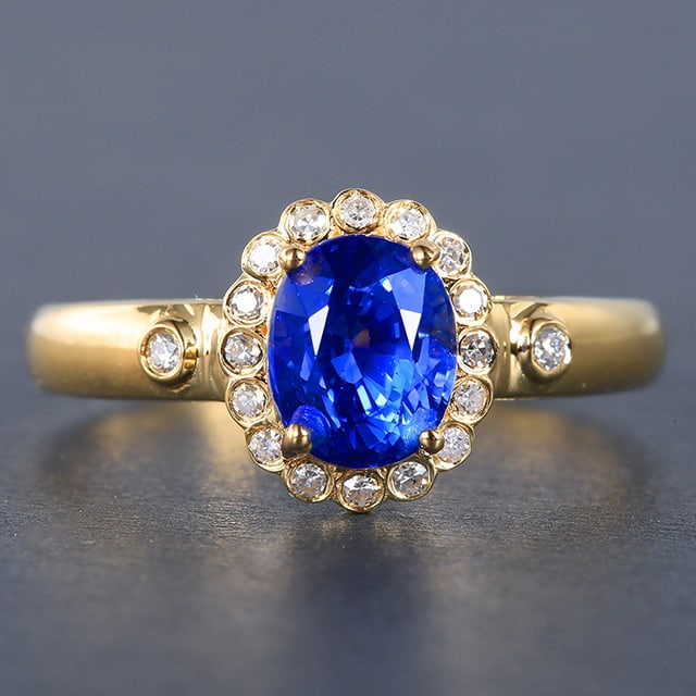 14k Gold 1.38 Ctw Natural Sapphire & Diamond Ring: Ref:231053084 // gold content:14k gold // ring size:7. 25us // // main gemstone:sapphire // shape:oval // carat weight:1. 25ct // color:blue // treatment:natural // // adjacent gemstone 2 : diamond