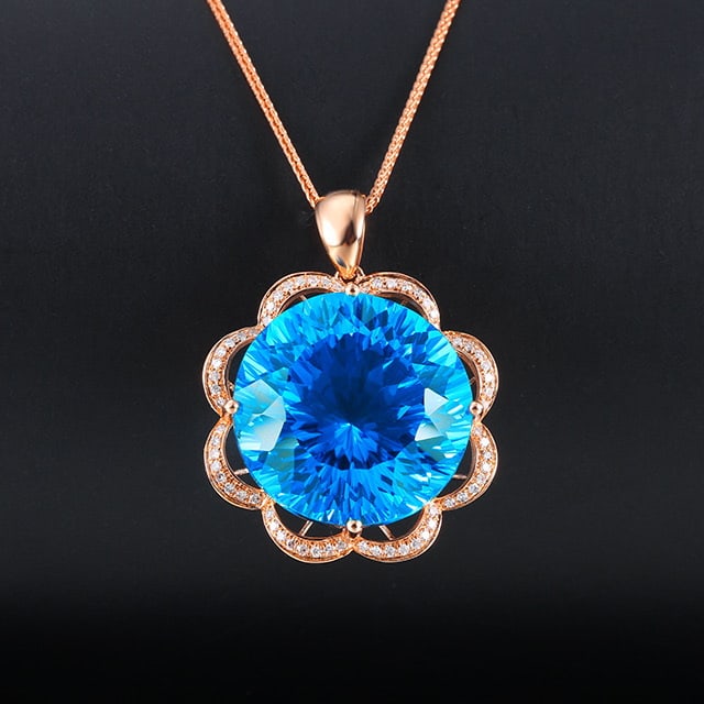 14k Gold 23.65 Ctw Natural Topaz & Diamond Pendant( Without Chain ): Ref:231053106 // gold content:14k gold // main gemstone:topaz // shape:round // carat weight:23. 46ct // color:blue // treatment:natural // cut grade:g // // adjacent gemstone 2 : diamond // number of