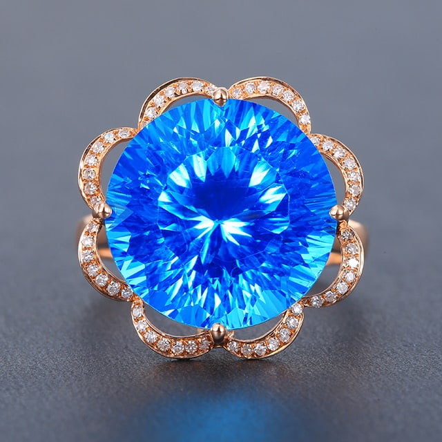 14k Gold 16.10 Ctw Natural Topaz & Diamond Ring: Ref:231053107 // gold content:14k gold // ring size:7. 25us // // main gemstone:topaz // shape:round // carat weight:15. 93ct // color:blue // treatment:natural // cut grade:g // // adjacent gemstone