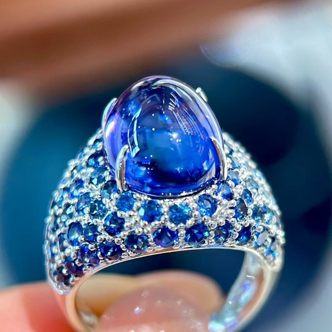 14k Gold 14.01 Ctw Natural Tanzanite & Sapphire Ring: Ref:231053114 // gold content:14k gold // ring size:7. 25us // // main gemstone:tanzanite // shape:oval // carat weight:9. 99ct // color:blue // treatment:natural // // adjacent gemstone 2 : sapphire