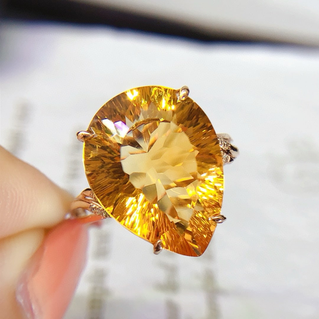 14k Gold 9.8 Ct Natural Citrine & Diamond Ring: Ref:231053122 // gold content:14k gold // ring size:7. 25us // // main gemstone:citrine // shape:pear // carat weight:9. 8ct // color:yellow // treatment:natural // // adjacent gemstone 2 : diamond