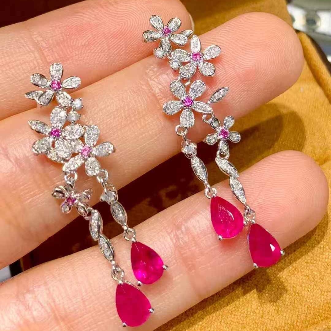 14k Gold 2.35 Ct Natural Ruby & Diamond Earrings: Ref:231053129 // gold content:14k gold // main gemstone:ruby // shape:pear // carat weight:2. 35ct // color:pinkish red // treatment:natural // // adjacent gemstone 2 : diamond // shape:round //