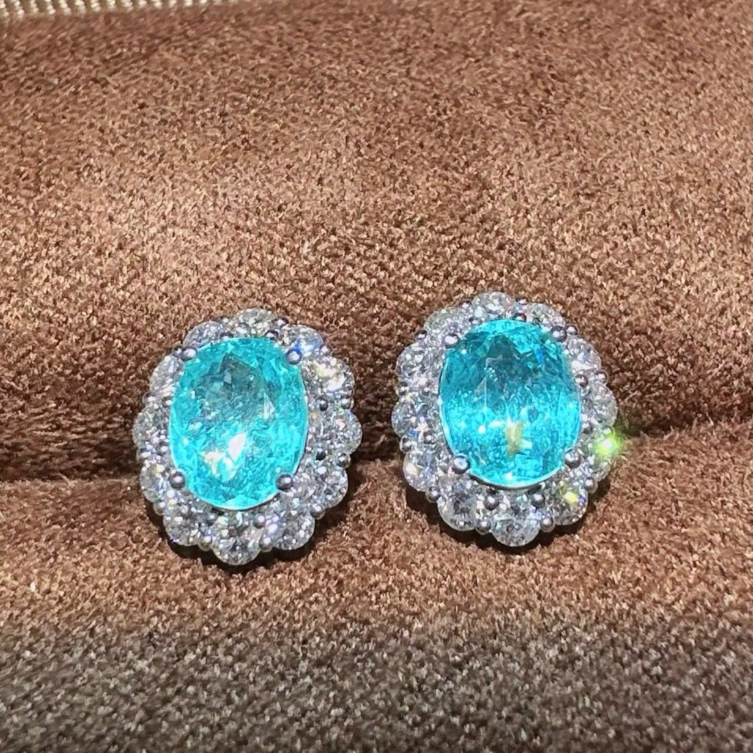 14k Gold 2.30 Ctw Natural Paraiba Tourmaline & Diamond Earrings: Ref:231053158 // gold content:14k gold // main gemstone:paraiba tourmaline // shape:oval // carat weight:1. 58ct // color:blue // treatment:natural // // adjacent gemstone 2 : diamond // shape:round /