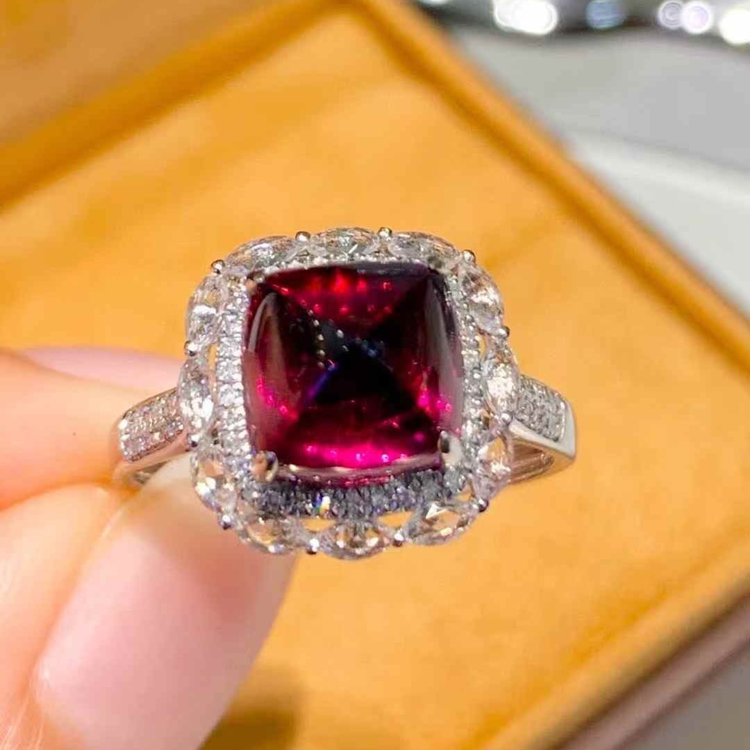 14k Gold 4.5 Ct Natural Tourmaline & Diamond & Sapphire Ring: Ref:231053190 // gold content:14k gold // ring size:7. 25us // // main gemstone:tourmaline // shape:sugar-loaf // carat weight:4. 5ct // color:red // treatment:natural // // adjacent gemstone 2 :