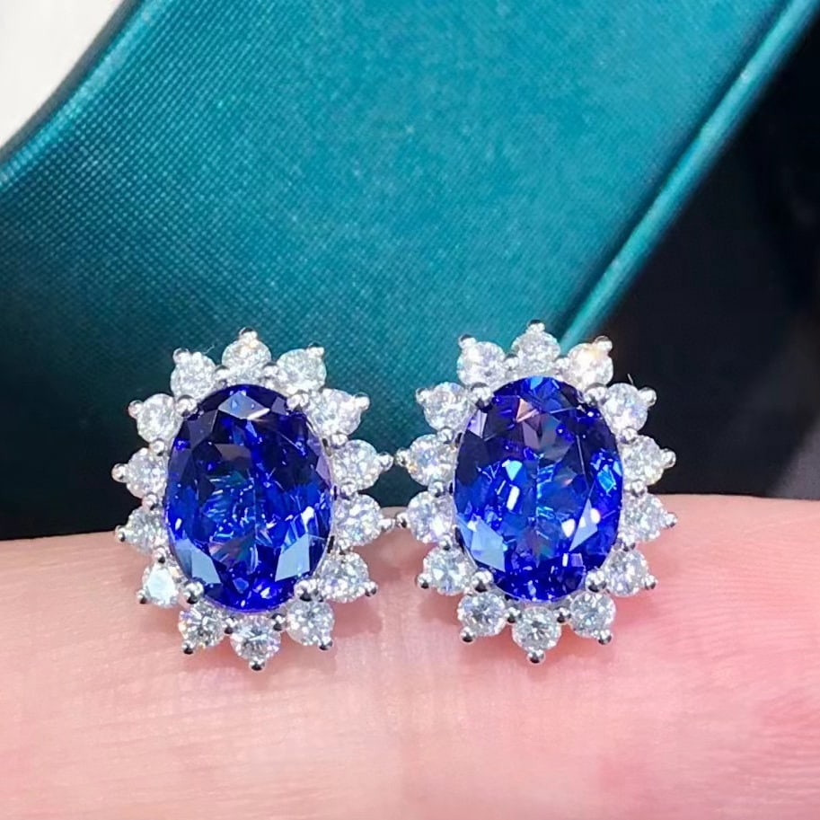 14k Gold 3.43 Ctw Natural Tanzanite & Diamond Earrings: Ref:231053194 // gold content:14k gold // main gemstone:tanzanite // shape:oval // carat weight:2. 78ct // color:blue // treatment:natural // // adjacent gemstone 2 : diamond // shape:round // carat