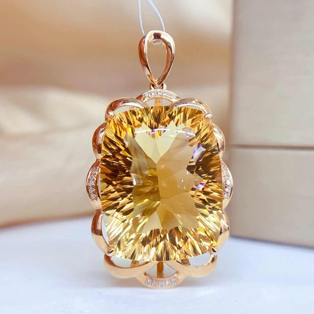 14k Gold 25.15 Ct Natural Citrine & Diamond Pendant( Without Chain ): Ref:231053202 // gold content:14k gold // main gemstone:citrine // shape:cushion // carat weight:25. 15ct // color:yellow // treatment:natural // // adjacent gemstone 2 : diamond // number of