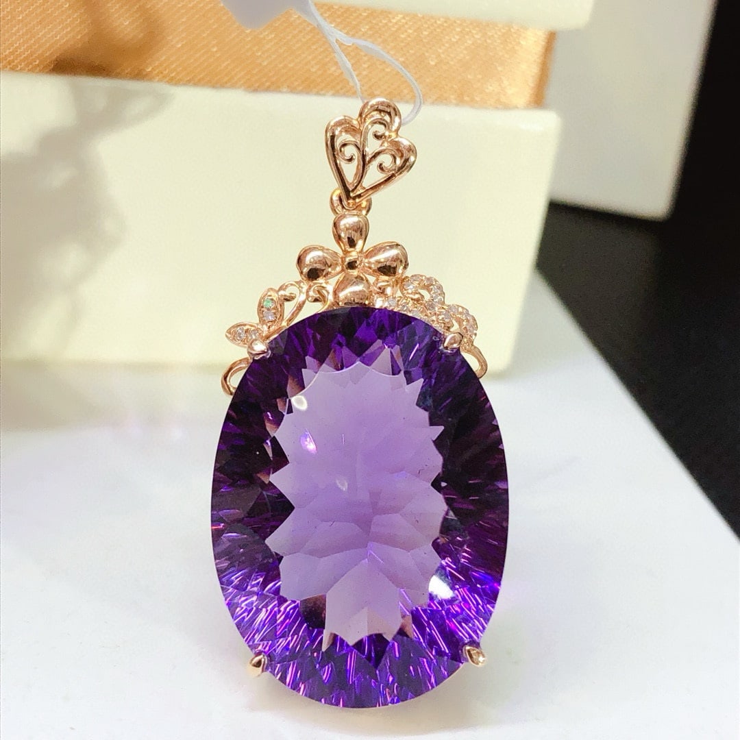 14k Gold 28.4 Ct Natural Amethyst & Diamond Pendant( Without Chain ): Ref:231053204 // gold content:14k gold // main gemstone:amethyst // shape:oval // carat weight:28. 4ct // color:purple // treatment:natural // // adjacent gemstone 2 : diamond // number of stones:20