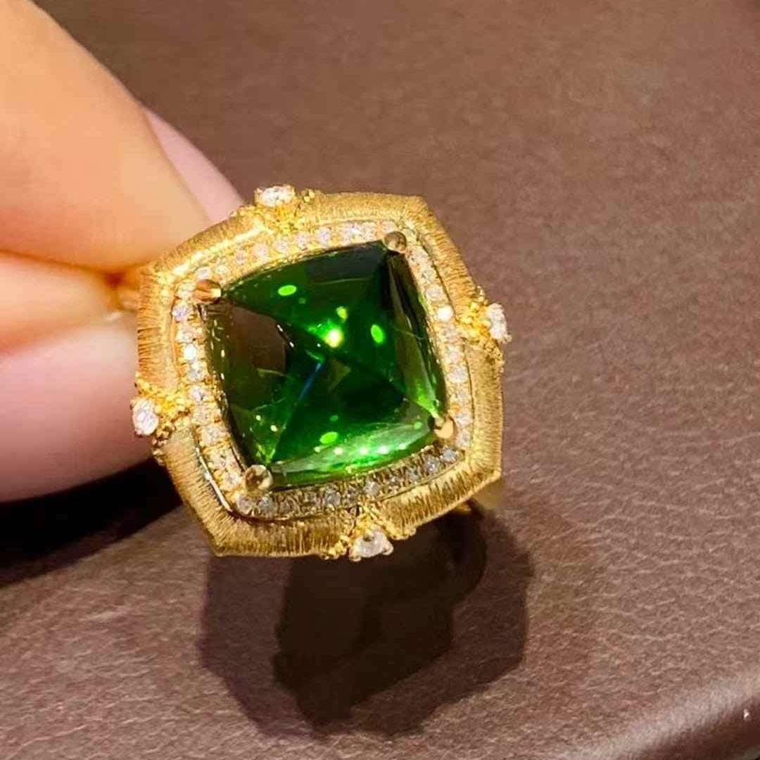 14k Gold 4.85 Ct Natural Tourmaline & Diamond Ring: Ref:231053235 // gold content:14k gold // ring size:7. 25us // // main gemstone:tourmaline // shape:sugar-loaf // carat weight:4. 85ct // color:green // treatment:natural // // adjacent gemstone 2 :