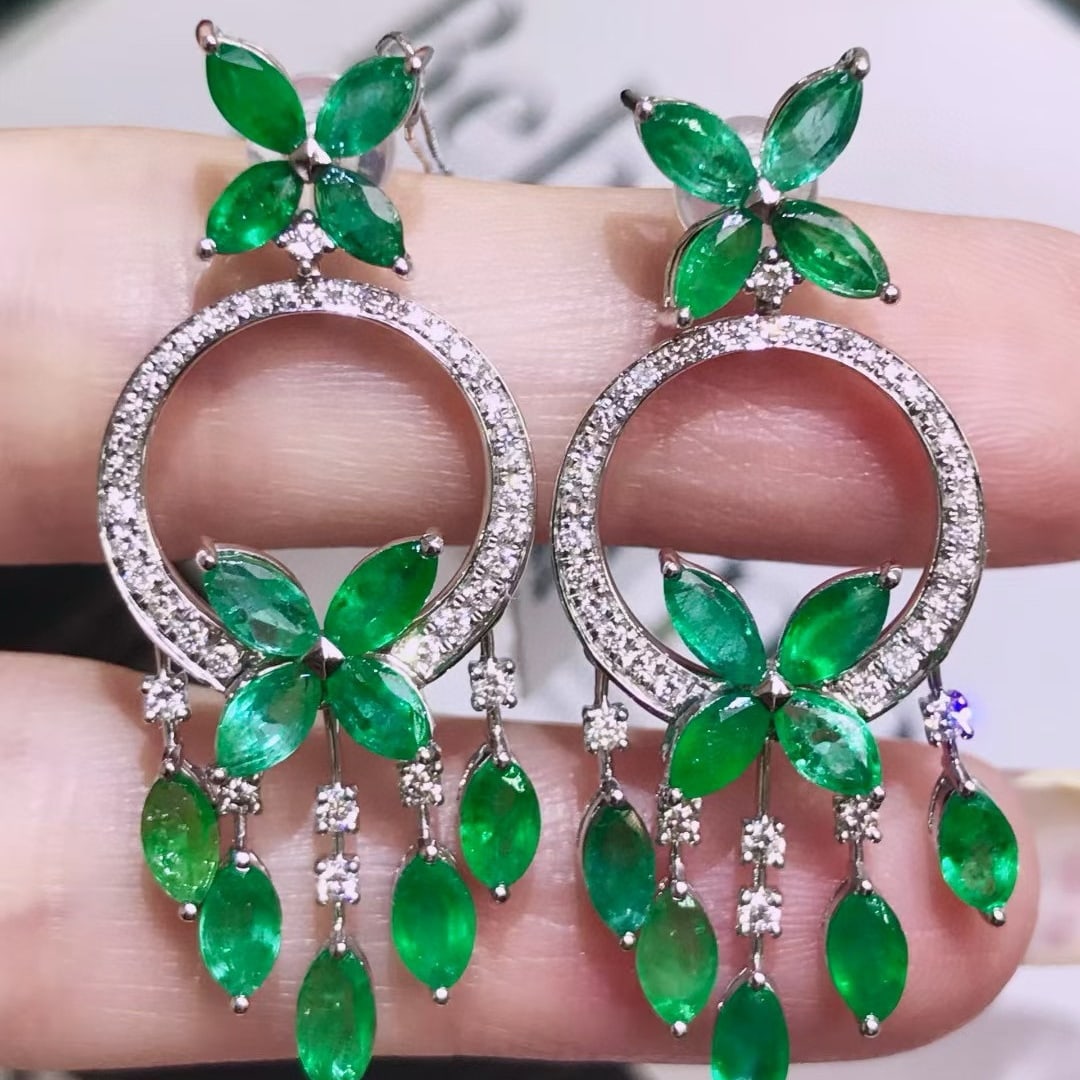14k Gold 6.25 Ctw Vivid Green Natural Emerald & Diamond Earrings: Ref:231053245 // gold content:14k gold // main gemstone:emerald // shape:marquise // carat weight:5. 5ct // color:vivid green // treatment:natural // // adjacent gemstone 2 : diamond // shape:round