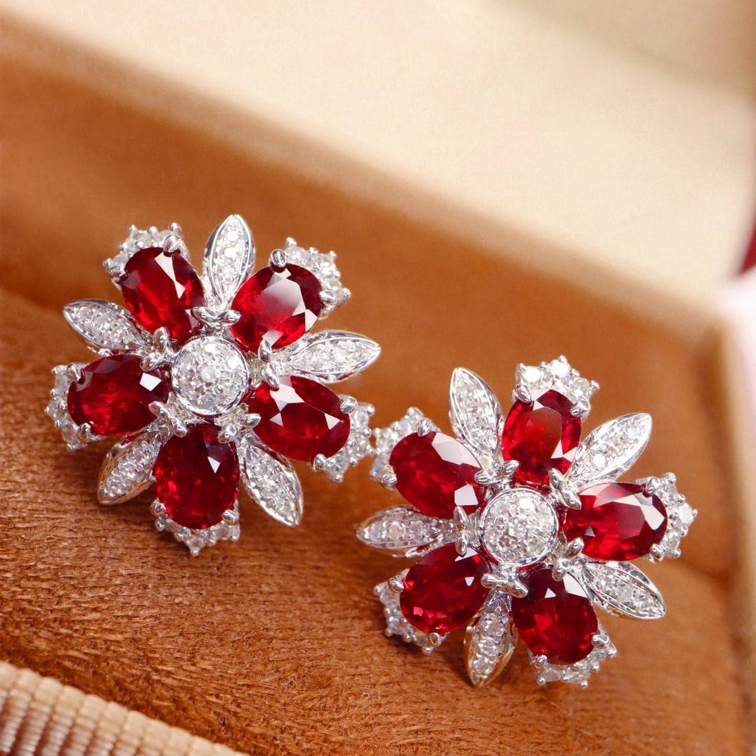 14k Gold 2.71 Ctw Natural Ruby & Diamond Earrings: Ref:231053246 // gold content:14k gold // main gemstone:ruby // shape:oval // carat weight:2. 40ct // color:pigeonblood red // treatment:natural // // adjacent gemstone 2 : diamond // shape:round // c