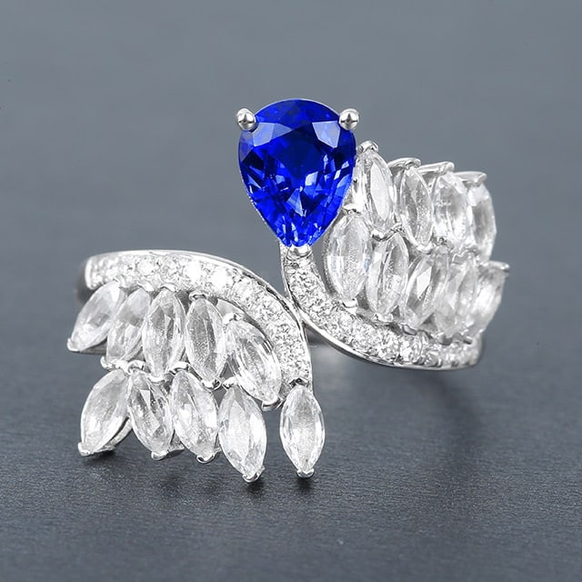 14k Gold 1.29 Ctw Natural Sapphire & Diamond Ring: Ref:231053253 // gold content:14k gold // ring size:7. 25us // // main gemstone:sapphire // shape:pear // carat weight:1. 12ct // color:cornflower blue // treatment:natural // // adjacent gemstone 2