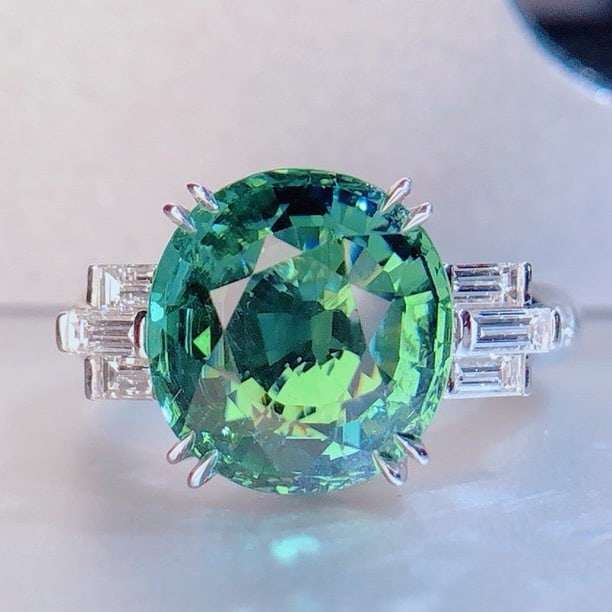 14k Gold 6.20 Ctw Natural Tourmaline & Diamond Ring: Ref:231054025 // gold content:14k gold // ring size:7. 25us // // main gemstone:tourmaline // shape:oval // carat weight:5. 33ct // color:green // treatment:natural // // adjacent gemstone 2 :