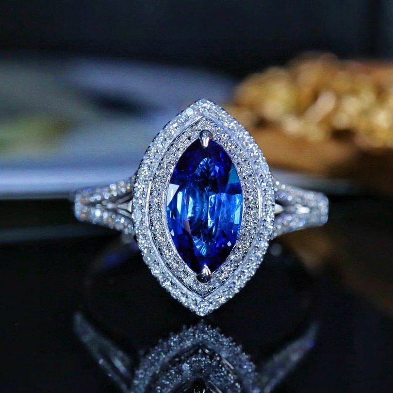 14k Gold 1.51 Ctw Natural Sapphire & Diamond Ring: Ref:231054041 // gold content:14k gold // ring size:7. 25us // // main gemstone:sapphire // shape:marquise // carat weight:1. 23ct // color:blue // treatment:natural // // adjacent gemstone 2 :