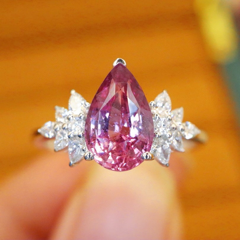 14k Gold 2.37 Ctw Natural Sapphire & Diamond Ring: Ref:231054088 // gold content:14k gold // ring size:7. 25us // // main gemstone:sapphire // shape:pear // carat weight:2. 06ct // color:pink // treatment:natural // // adjacent gemstone 2 : diamond //