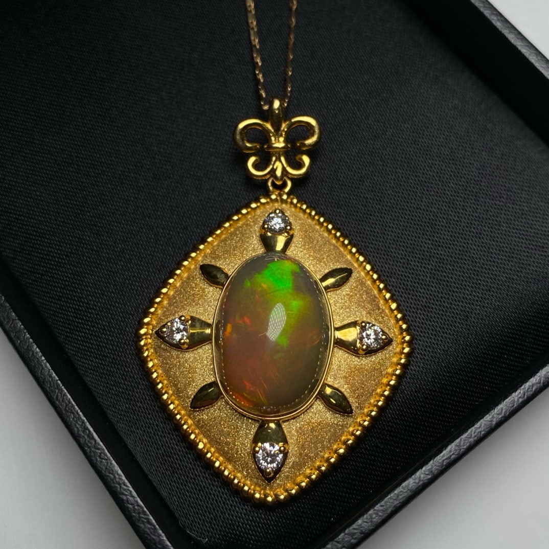 14k Gold 8.65 Ctw Natural Opal & Diamond Pendant( Without Chain ): Ref:231054129 // gold content:14k gold // main gemstone:opal // shape:oval // carat weight:8. 35ct // color:color // treatment:natural // // adjacent gemstone 2 : diamond // shape:round // carat