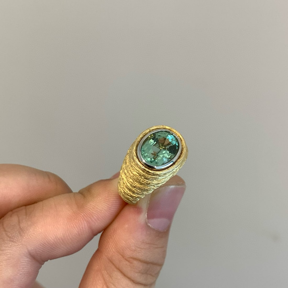 14k Gold 2.97 Ct Natural Tourmaline Ring: Ref:231054144 // gold content:14k gold // ring size:7. 25us // // main gemstone:tourmaline // shape:oval // carat weight:2. 97ct // color:green // treatment:natural // Condition: New Low Estimate: