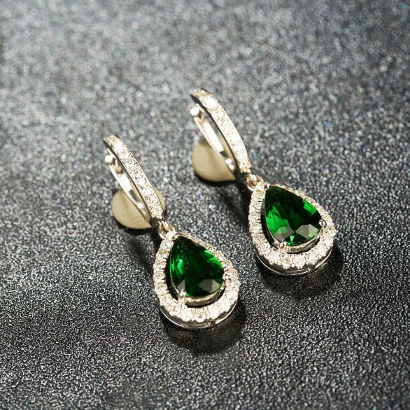 14k Gold 2.20 Ctw Natural Tourmaline & Diamond Earrings: Ref:231054238 // gold content:14k gold // main gemstone:tourmaline // shape:pear // carat weight:1. 68ct // color:green // treatment:natural // // adjacent gemstone 2 : diamond // shape:round //
