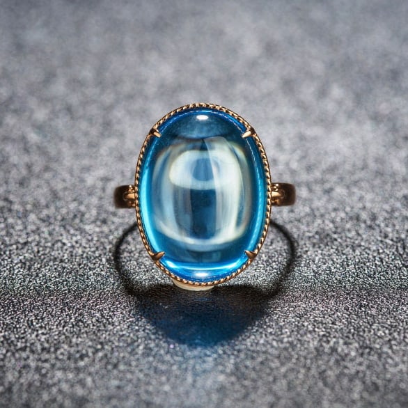 14k Gold 15.52 Ct Natural Topaz Ring: Ref:231054256 // gold content:14k gold // ring size:7. 25us // // main gemstone:topaz // shape:oval // carat weight:15. 52ct // color:blue // treatment:natural // Low Estimate: 2600 Condition: New