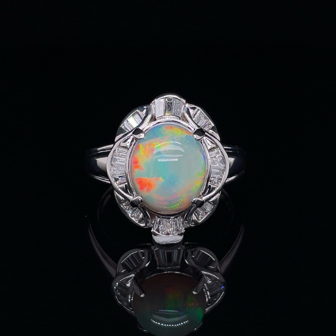 14k Gold 2.68 Ctw Natural Opal & Diamond Ring: Ref:231054277 // gold content:14k gold // ring size:7. 25us // // main gemstone:opal // shape:oval // carat weight:2. 31ct // color:color // treatment:natural // // adjacent gemstone 2 : diamond //