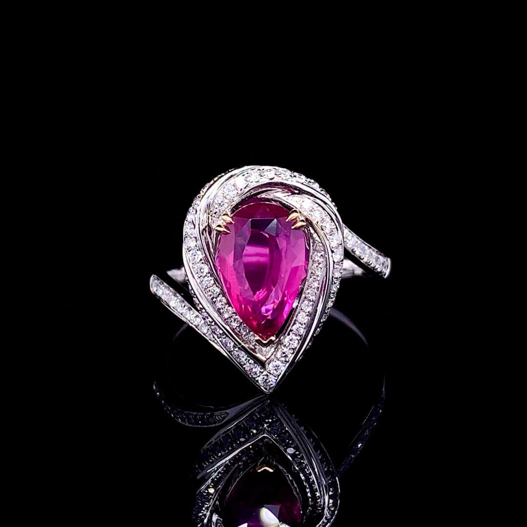 14k Gold 2.43 Ctw Natural Ruby & Diamond Ring: Ref:231054280 // gold content:14k gold // ring size:7. 25us // // main gemstone:ruby // shape:pear // carat weight:2. 04ct // color:red // treatment:natural // // adjacent gemstone 2 : diamond // shap
