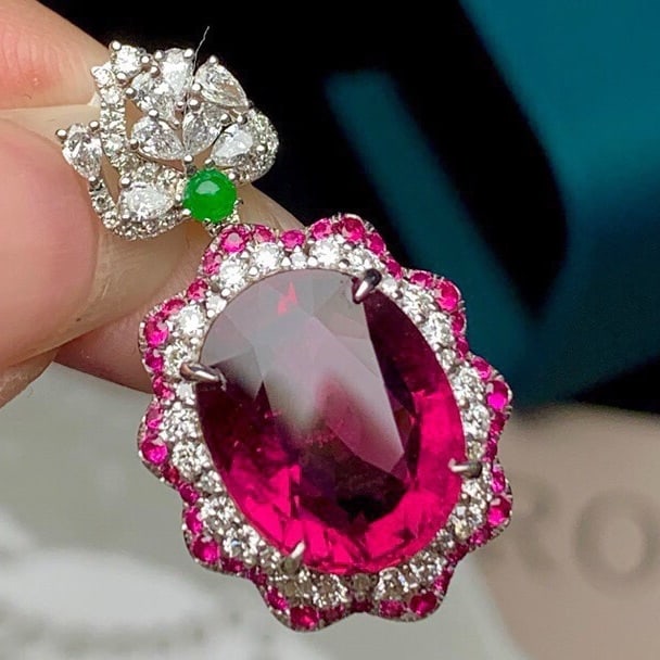 14k Gold 9.3 Ct Natural Tourmaline & Diamond Pendant( Without Chain ): Ref:231054307 // gold content:14k gold // main gemstone:tourmaline // shape:oval // carat weight:9. 3ct // color:red // treatment:natural // // adjacent gemstone 2 : diamond // shape:multiply //