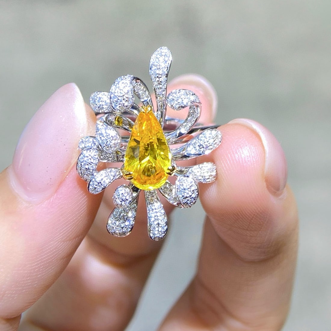 14k Gold 2.68 Ctw Natural Sapphire & Diamond Ring: Ref:231054388 // gold content:14k gold // ring size:7. 25us // // main gemstone:sapphire // shape:pear // carat weight:2. 12ct // color:canary // treatment:natural // // adjacent gemstone 2 : diamond 