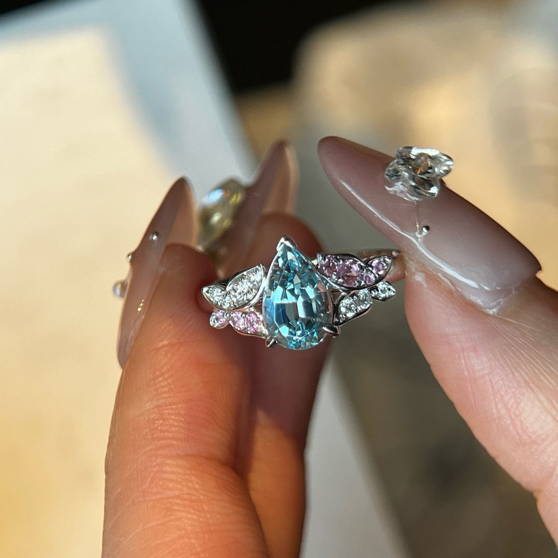 14k Gold 1.29 Ctw Natural Aquamarine & Diamond Ring: Ref:231054396 // gold content:14k gold // ring size:7. 25us // // main gemstone:aquamarine // shape:pear // carat weight:1. 19ct // color:blue // treatment:natural // // adjacent gemstone 2 : diamond 