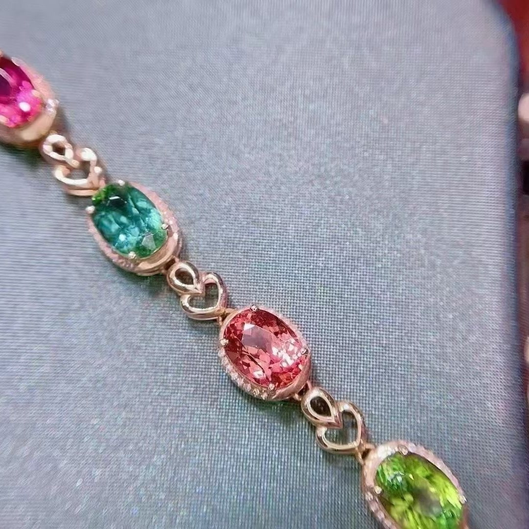 14k Gold 7.5 Ct Natural Tourmaline & Diamond Bracelet: Ref:231054428 // gold content:14k gold // main gemstone:tourmaline // shape:oval // carat weight:7. 5ct // color:color // treatment:natural // // adjacent gemstone 2 : diamond // shape:round //
